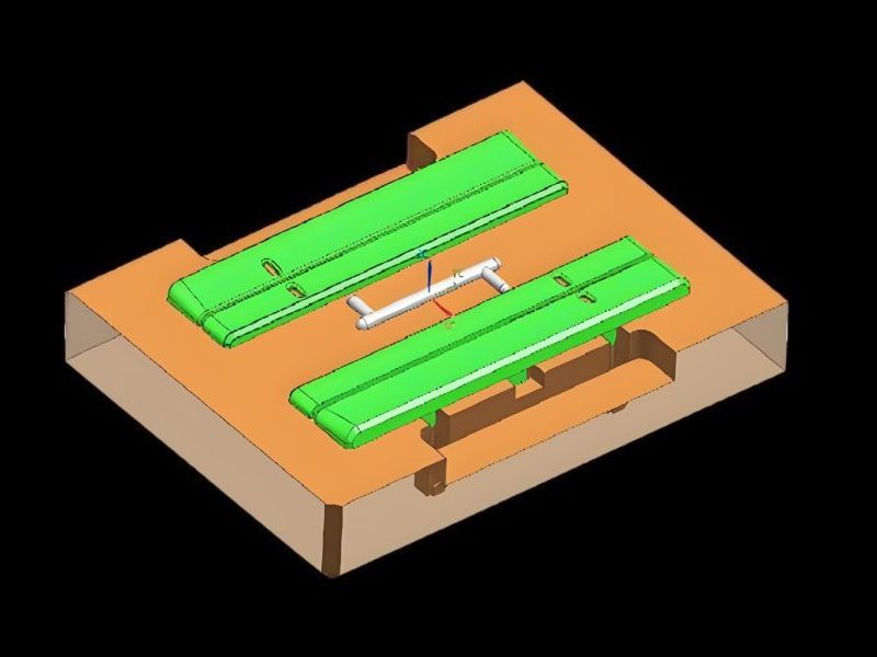 Diagram showing the complete gating system of a plastic mold with sprue, runners, gates, and cold slug wells