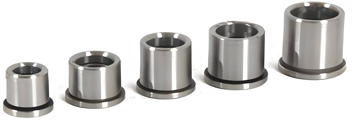 Guide posts and bushings showing precision guiding components