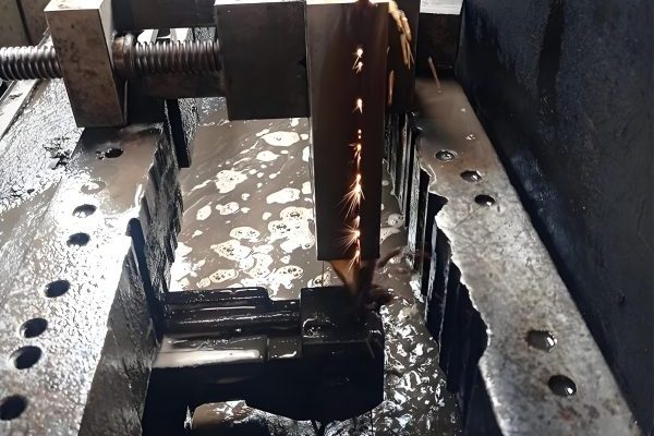 Wire EDM cutting complex shapes from metal sheets for die components